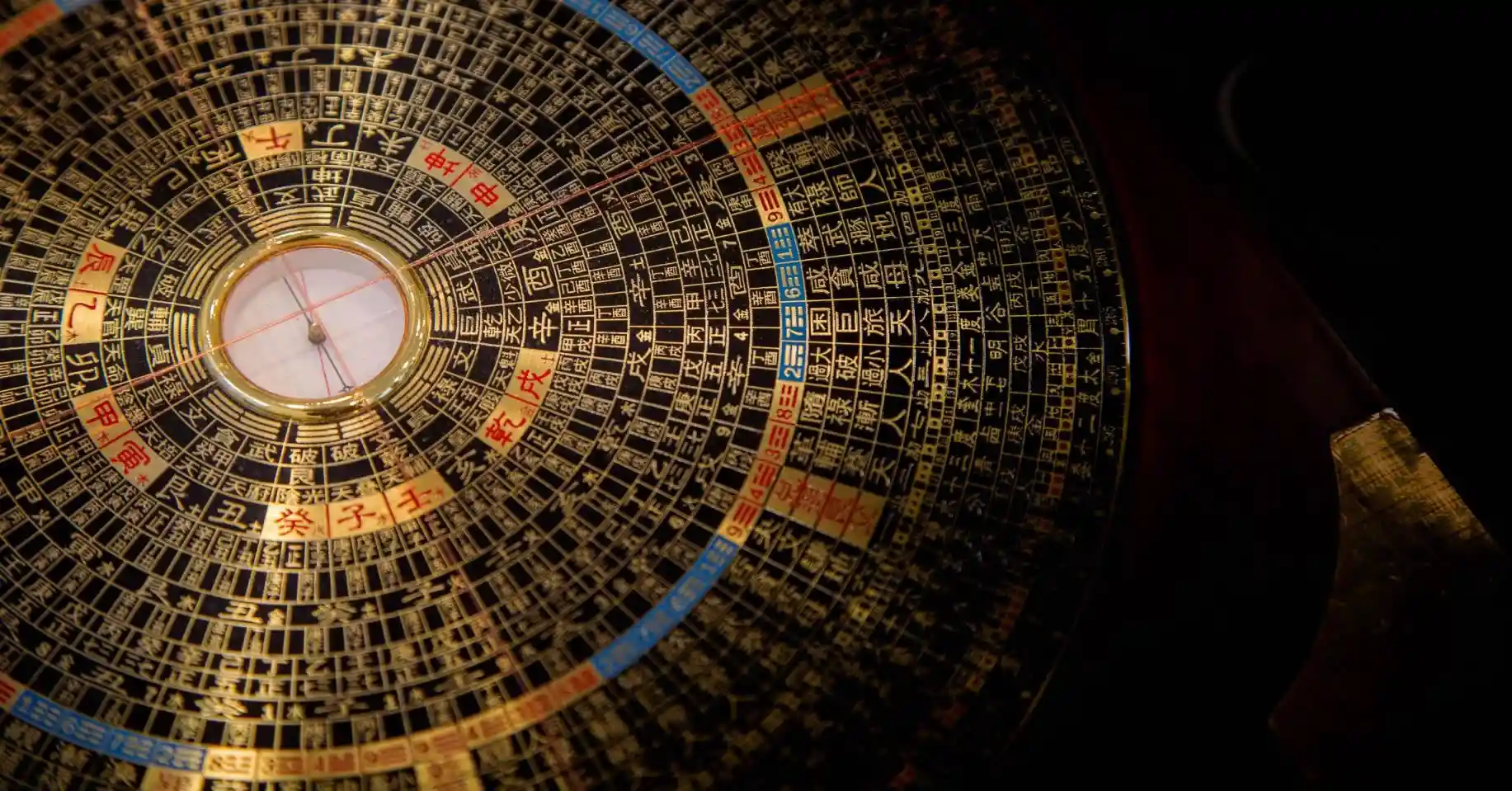 Crafting traditional Luopan feng shui compasses, designed for geomantic harmony.